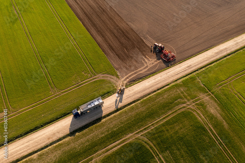 Drone photography of agricultural machinery getting ready for work