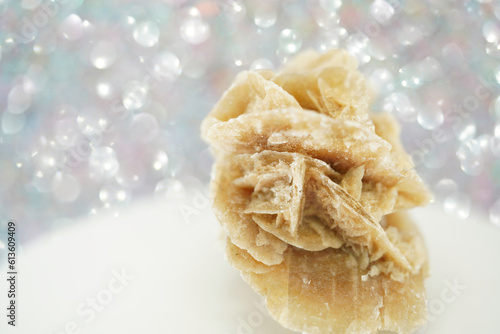 Gypsum rose with a crystal on a cut out background, Crystals resembling the shape of rose photo