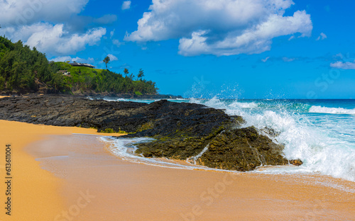 Waves Crash Over Exposed Lava Reef, Kauapea Beach, Kauai, Hawaii, USA photo