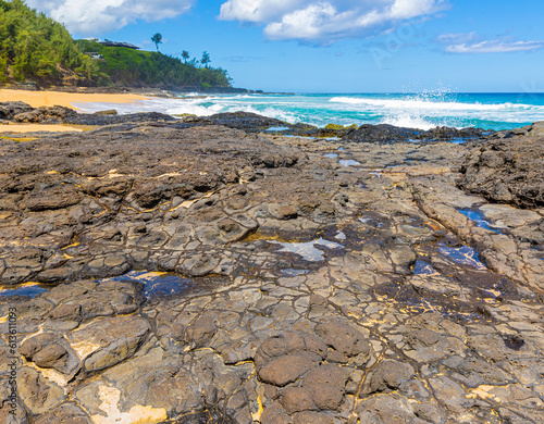 Waves Crash Over Exposed Lava Reef  Kauapea Beach  Kauai  Hawaii  USA