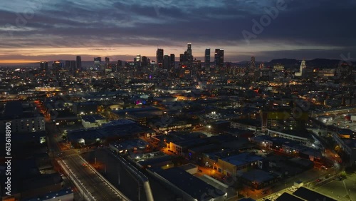 Wallpaper Mural Fly above night city. Aerial panoramic view of buildings in urban borough and skyscrapers in background. Los Angeles, California, USA Torontodigital.ca