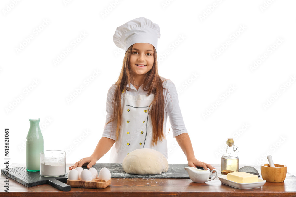 Little baker at table with dough on white background Little baker at table with dough on white background