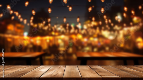 Wooden table for product display with a blurred party in background