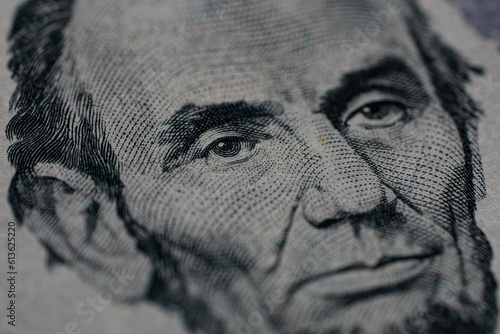 US President Abraham Abe Lincoln on USA five dollar bill extreme macro, 5 usd, United States of America money closeup