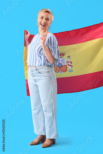 Happy mature woman with fla...