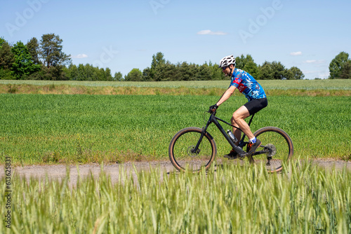 A man on a mountain bike.