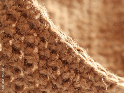 Close up brown texture, crocheting from jute, eco style concept