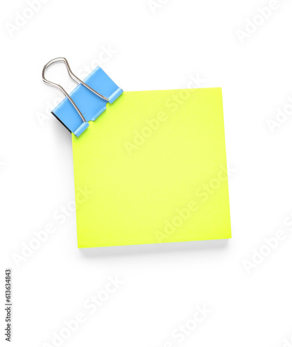 Bright yellow sticky note w...