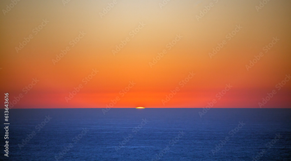 Obraz premium Colors of the sky landscape over the evening sea horizon in the geographical south of the Africa.