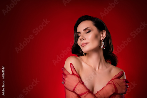 Studio portrait of amazing confident lady embrace herself wear transparent red lace long gloves close eyes from joy