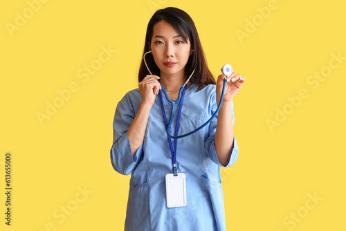 Female Asian medical intern...