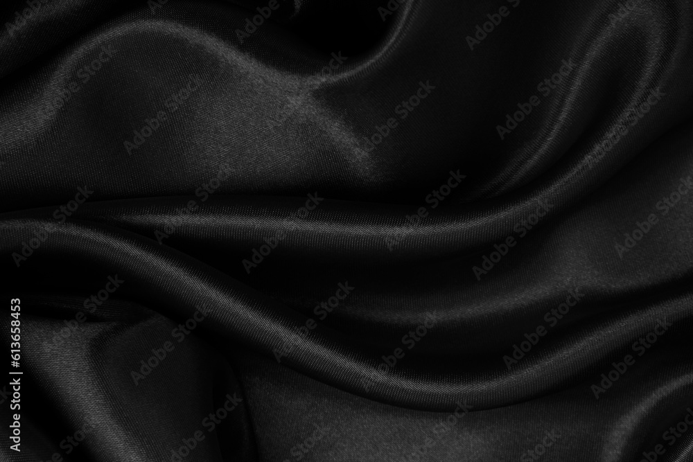 Fototapeta premium Smooth elegant black silk or satin luxury cloth texture as abstract background. Luxurious background design