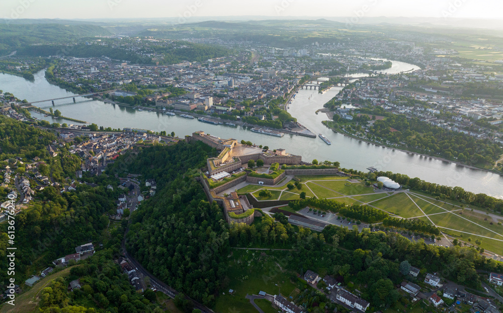 Wide Aerial Drone Shot of Ehrenbreitstein Fortress on the river rhine in Koblenz in evening, Rheinland-Pfalz, Germany