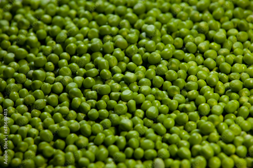 Sweet green peas background. Selective focus.