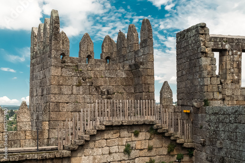 Guimaraes, Portugal. April 14, 2022: Walls and structures of Guimarães castle with blue sky. photo