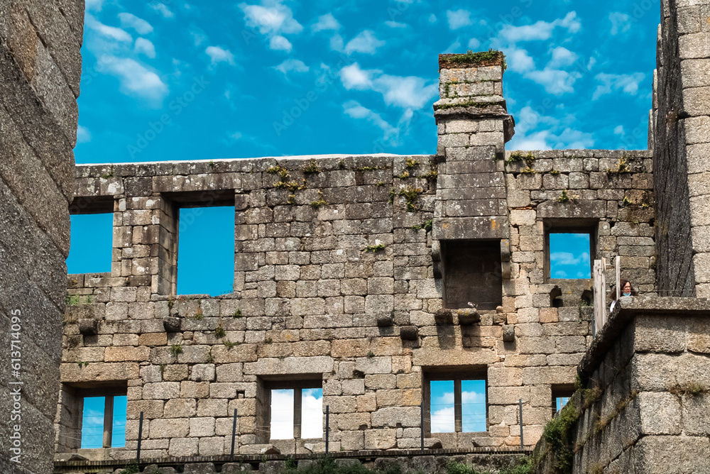 Guimaraes, Portugal. April 14, 2022: Walls and structures of Guimarães castle with blue sky.