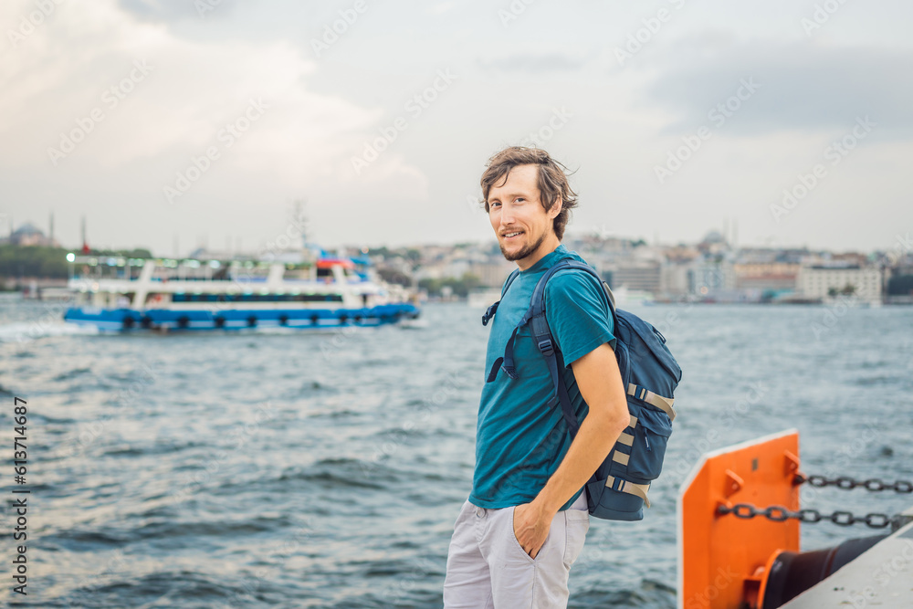 Man tourist enjoying Galataport area view, cruise port of Istanbul newly opening in 2021, located in the shores of the Galata, Karakoy in Istanbul Man tourist enjoying Galataport area view, cruise port of Istanbul newly opening in 2021, located in the shores of the Galata, Karakoy in Istanbul