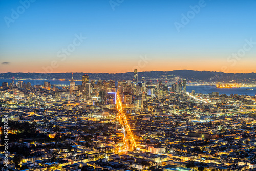 The skyline of San Francisco with Oakland in the back before sunrise © elxeneize