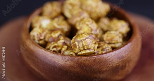 delicious sweet popcorn with lots of caramel, caramel flavor of popcorn close-up photo
