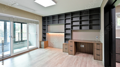 Wallpaper Mural Using built-in furniture, one side of the wall was turned into a bookshelf Torontodigital.ca