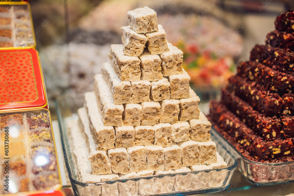 Traditional oriental sweet pastry cookies, nuts, dried fruits, pastilles, marmalade, Turkish desert with sugar, honey and pistachio, in display at a street food market Traditional oriental sweet pastry cookies, nuts, dried fruits, pastilles, marmalade, Turkish desert with sugar, honey and pistachio, in display at a street food market