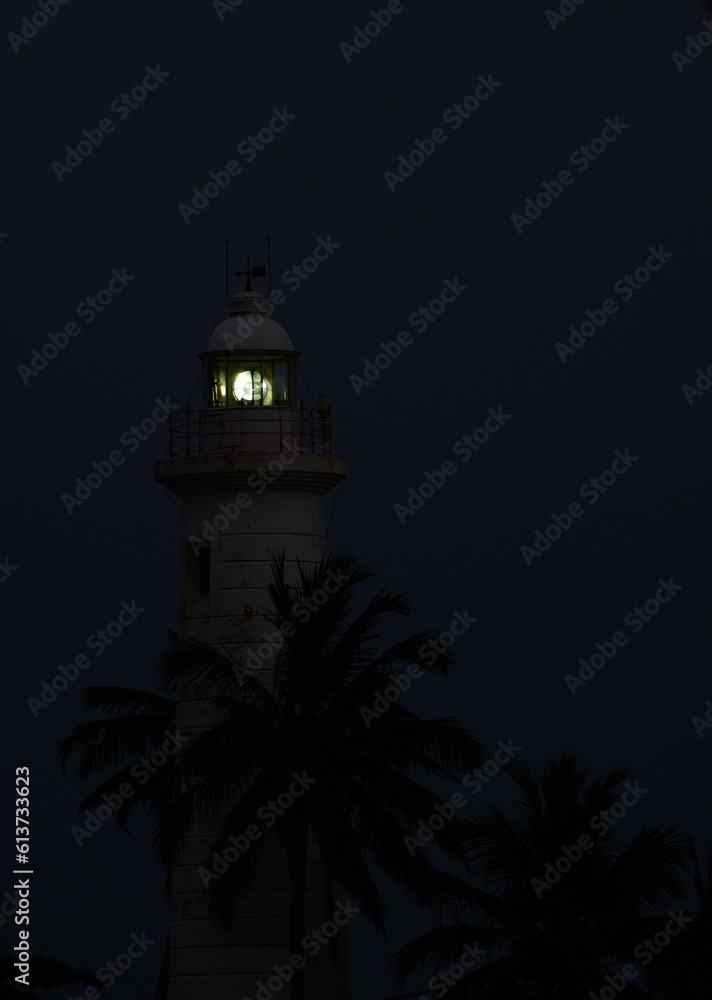 Lighthouse signal illuminated in the night, Galle Dutch fort.