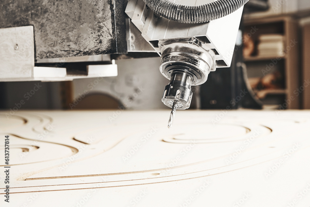 Numerically controlled woodworking machine cuts rounded complex lines