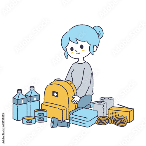 防災用品の準備をする女性