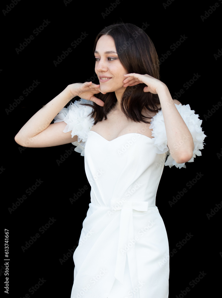Portrait of a beautiful brunette in a white wedding dress Portrait of a beautiful brunette in a white wedding dress