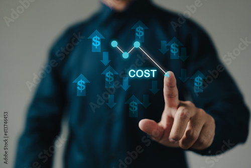 Fototapeta The business finance concept of cost reduction is represented by dollar symbols and a downward arrow, emphasizing the importance of reducing expenses and optimizing financial efficiency