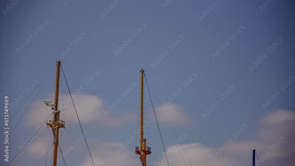 Wooden ship masts moving due to waves of sea, time lapse view Wooden ship masts moving due to waves of sea, time lapse view