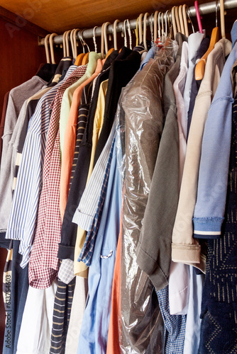 Closet full of old men's clothes © FotoGarageAG