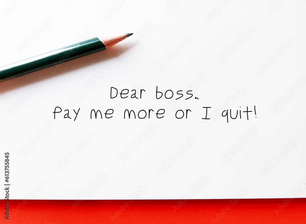 Office paper with handwritten text DEAR BOSS, PAY ME MORE OR I QUIT ,Workers salary negotiation with bosses, offer to stay if receiving a salary increase Office paper with handwritten text DEAR BOSS, PAY ME MORE OR I QUIT ,Workers salary negotiation with bosses, offer to stay if receiving a salary increase