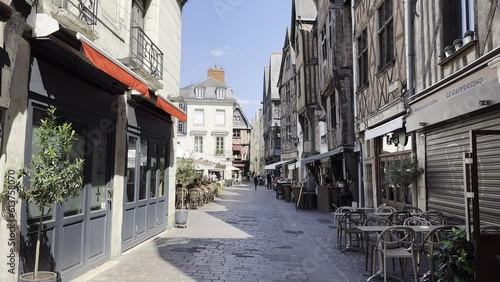 Tours famous for its original medieval district – Vieux Tours. Place Plumereau lined with wood-framed, stone-gabled townhouses dating back to the 12th-15th centuries photo