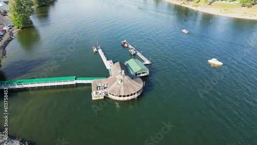 Coeur d' Alene, Idaho USA - June 07 2023: Aerial view of one of the most popular restaurants in the city, Cedars Floating Restaurant in Lake Coeur d' Alene. photo