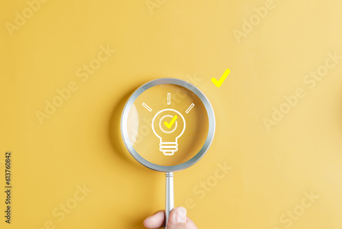 Quick tips for smart creative. light bulb and idea checking icon inside magnifier glass, working Creativity, Creative for new innovation with energy and power, growth and success development..