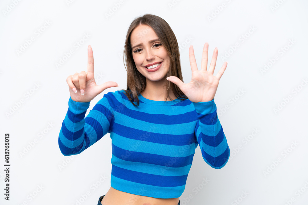 Young pretty caucasian woman isolated on white background counting seven with fingers Young pretty caucasian woman isolated on white background counting seven with fingers