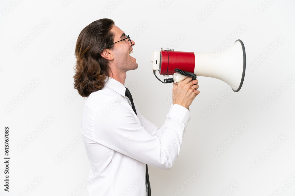 Business handsome man isolated on white background shouting through a megaphone Business handsome man isolated on white background shouting through a megaphone