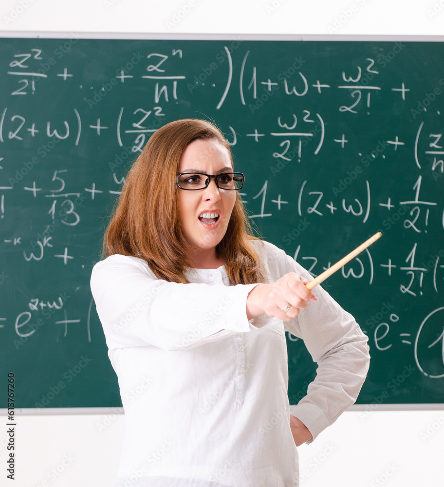 Female math teacher in the classroom