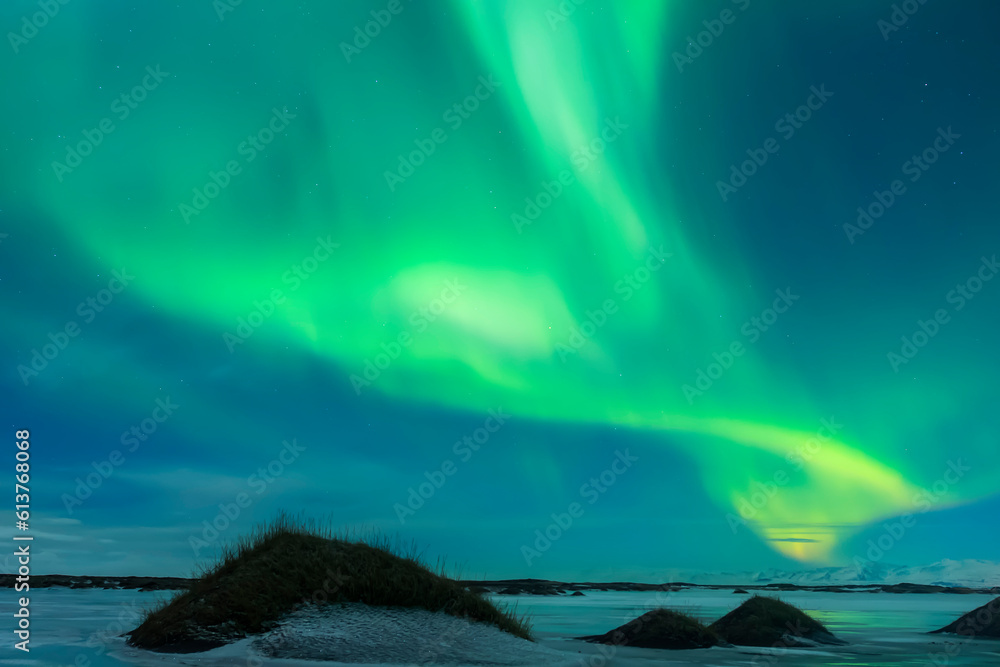 Landscape with northern lights over Iceland