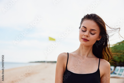 woman ocean water young summer beach vacation nature sand sea smile