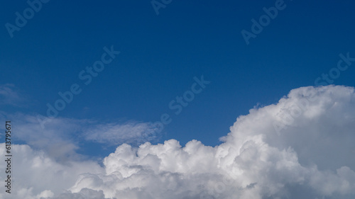 Blue clouds in the sky. White fluffy clouds. Clouds close-up