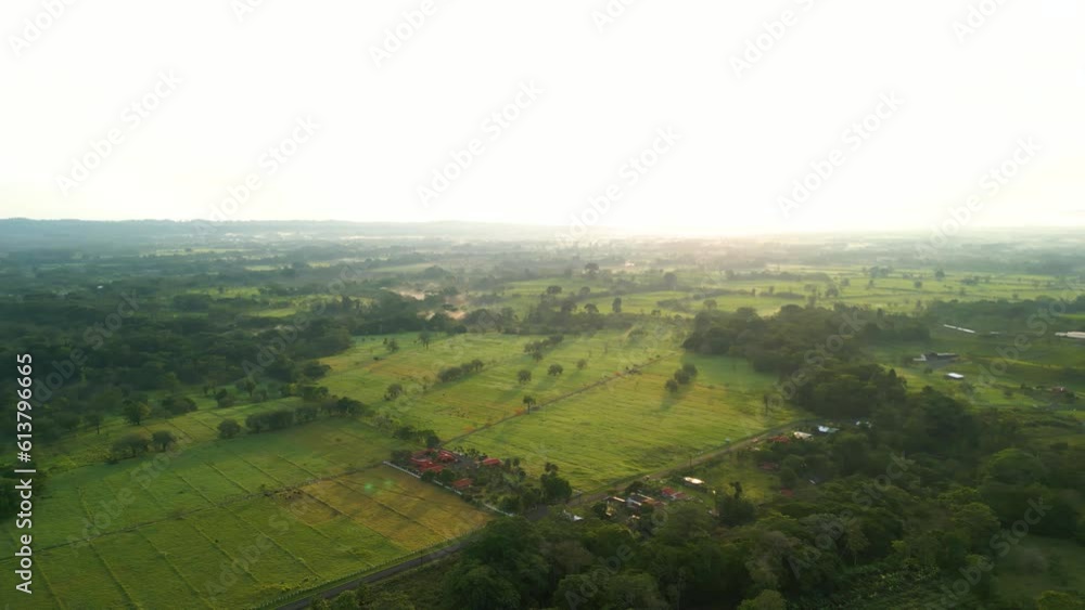 Aerial wide landscape drone orbit of La Fortuna de San Carlos in Costa Rica during a beautiful morning. Aerial wide landscape drone orbit of La Fortuna de San Carlos in Costa Rica during a beautiful morning.