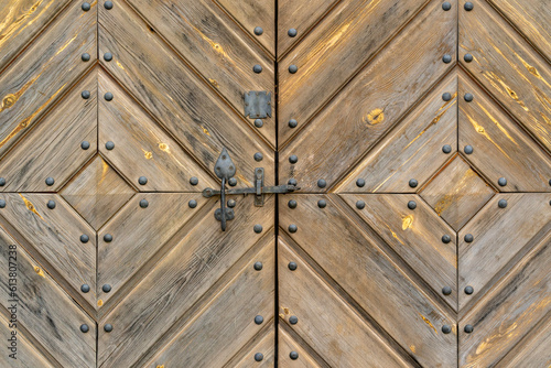 Detailed background image of an old wooden door