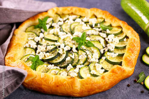 Bild auf Leinwand pie with zucchini and feta cheese