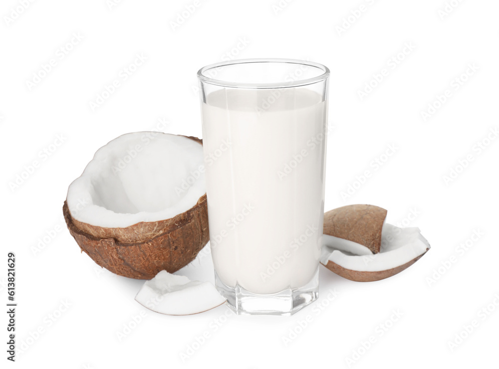 Glass of delicious vegan milk and coconut pieces on white background Glass of delicious vegan milk and coconut pieces on white background