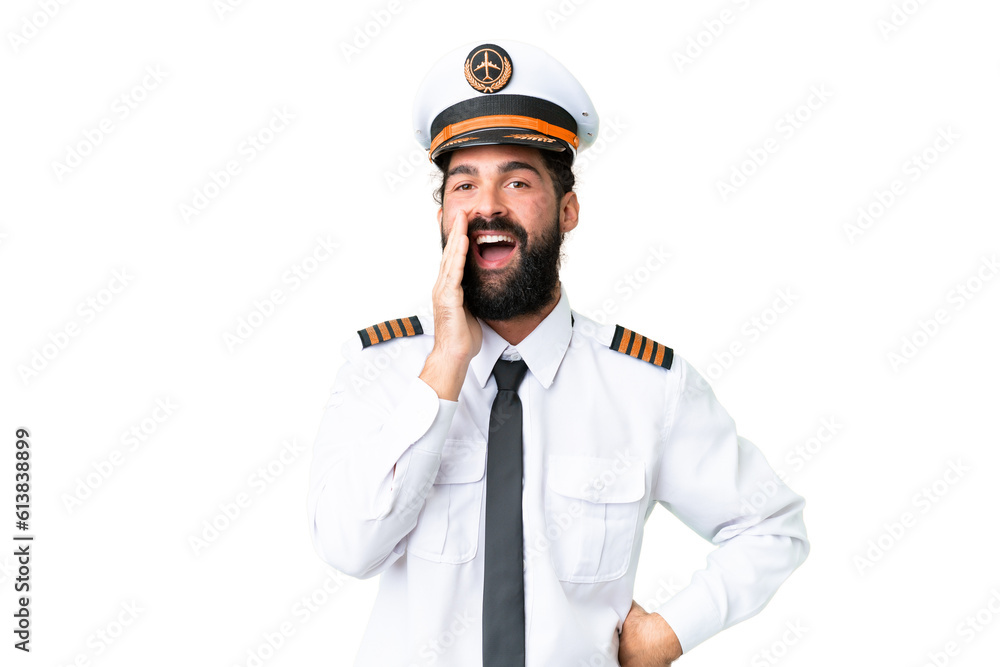 Airplane caucasian pilot man over isolated chroma key background shouting with mouth wide open Airplane caucasian pilot man over isolated chroma key background shouting with mouth wide open