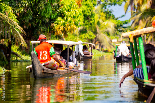 Kerala backwaters, India. Boats on the canals	 photo