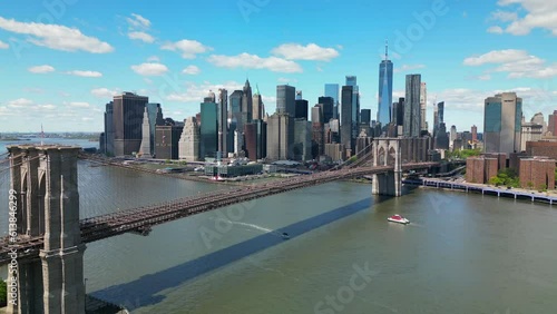 Beautiful Flyover View of the Brooklyn Bridge and New York City photo