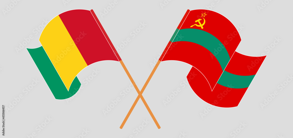 Crossed and waving flags of Guinea and Transnistria Crossed and waving flags of Guinea and Transnistria